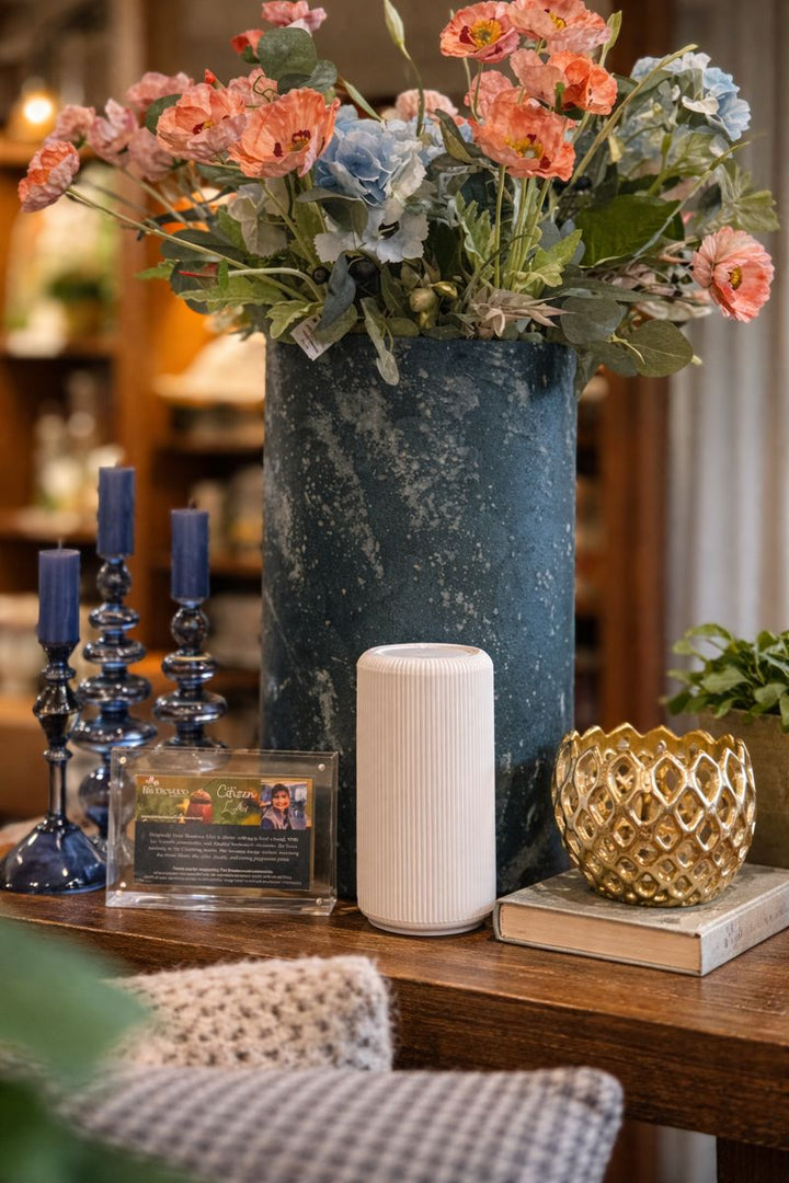 White Tabletop Device with Pura Packaging